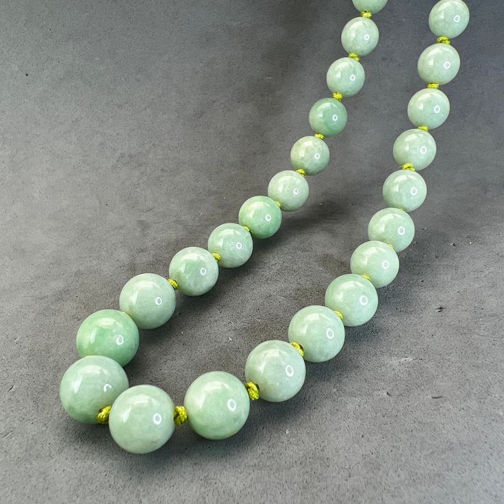 "Style: Estate Burmese jade round bead necklace, natural color fei cui, with a matching silver clasp. 51 beads Material: Natural Jadeite, jadeite, vintage, Burmese jade, green, silver clasp Method: fine polished Type: Necklace, bead necklace Size: bead size 10mm, length 23\"	is_active	18274967	Apparel & Accessories > Jewelry > Necklaces	https://www.etsy.com/listing/1210220591/estate-sale-jade-necklace-plain-round	weddings > jewelry > necklaces	https://i.etsystatic.com/18274967/r/il/ccd1af/378917 Cheap Polished Bead Jade Necklaces, Traditional Jade Beaded Necklaces, Jade Gemstone Beads Necklaces, Beaded Jade Necklaces With Gemstone Beads, Jade Beaded Necklaces With Gemstone Beads, Jade Beaded Necklace With Gemstone Beads, Jade Necklace With Round Gemstone Beads, Classic Green Jewelry With 8mm Beads, Elegant Round Jade Beaded Necklaces