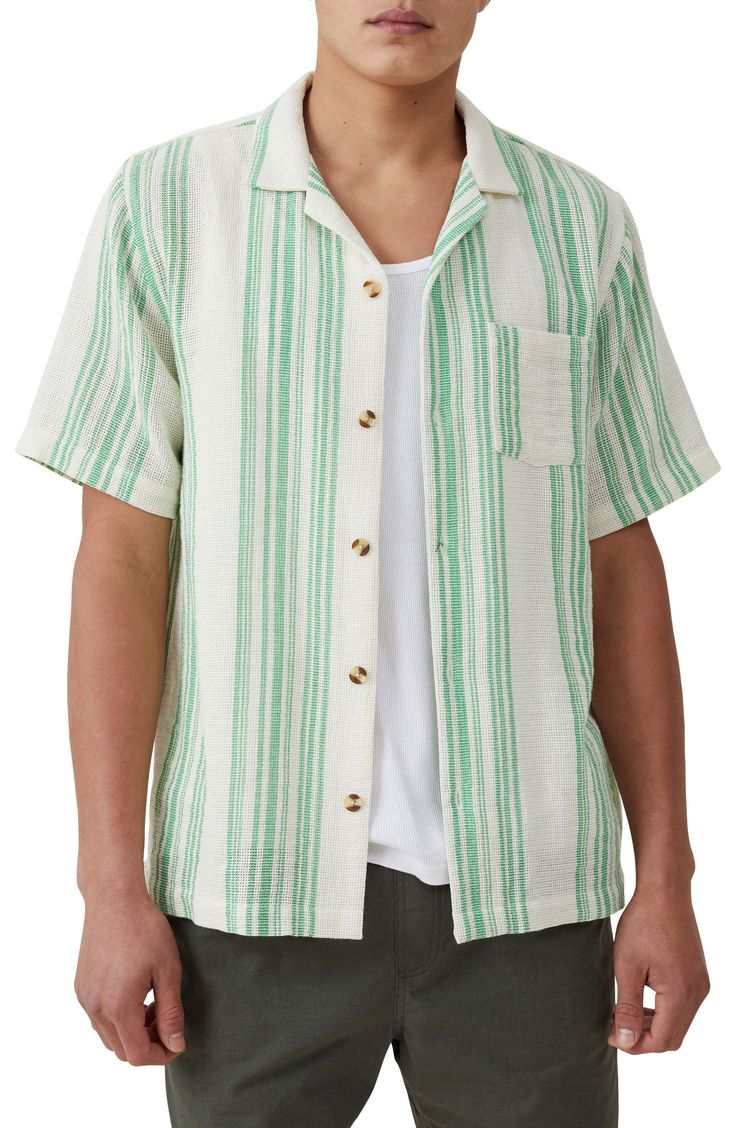 A relaxed fit and a cool notched collar bring sunshine-ready vibes to this stylish camp shirt. Front button closure Notched collar Short sleeves Chest patch pocket 60% cotton, 40% polyester Machine wash, line dry Imported Affordable Green Cotton Camp Shirt, Tropical Relaxed Fit Cotton Camp Shirt, Classic Green Cotton Camp Shirt, Beach Cotton T-shirt With Camp Collar, Beach-ready Cotton Camp Collar Top, Camping Shirt, Green Stripes, Casual Button Down Shirts, Long Sleeve Shirts