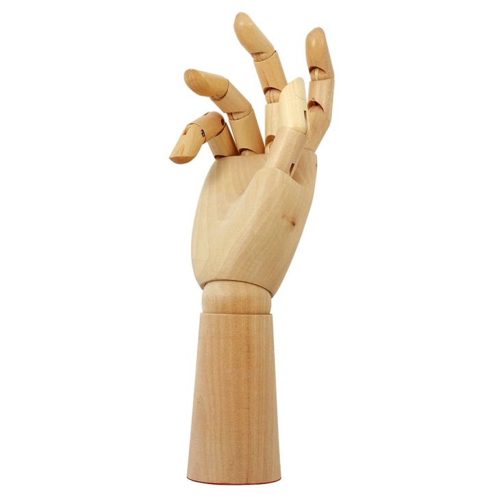 a wooden hand that is holding something in the air