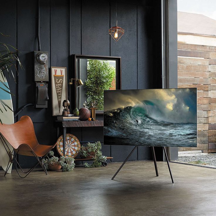 a living room filled with furniture and a fire place