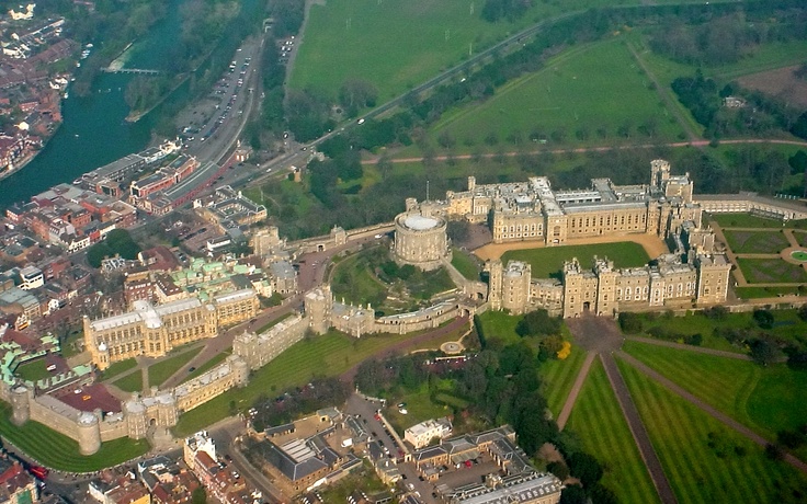 an aerial view of windsor castle and the river thames