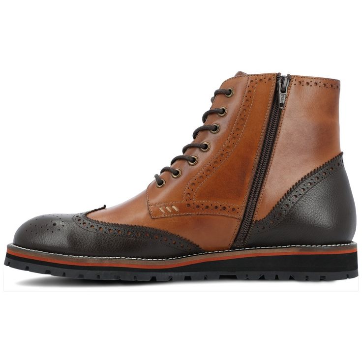 The Elijah boot by Thomas & Vine is crafted with authentic leather and wingtip details for an upscale look. A classic lace-up closure with brogue accents secures this well-made ankle-high style. The style is completed with a 6 mm Comfort Foam� footbed and a modern EVA outsole for a light and comfortable fit. Casual Wingtip Lace-up Boots For Fall, Leather Wingtip Lace-up Boots With Leather Sole, Casual Brogue Ankle Lace-up Boots, Leather Ankle-high Brogue Boots, Ankle-high Leather Boots With Brogue Detailing, Winter Ankle-high Brogue Boots, Fall High-top Lace-up Boots With Leather Lining, Winter High-top Boots With Brogue Detailing, Winter Lace-up Boots With Brogue Detailing