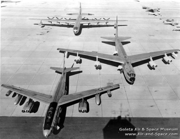 an old black and white photo of airplanes on the tarmac