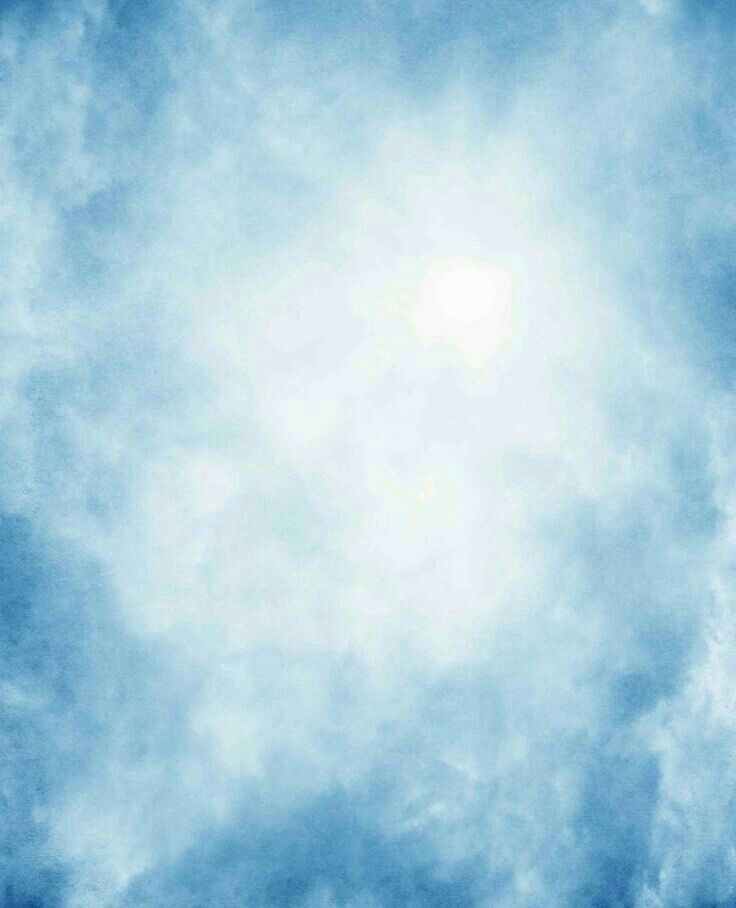 an airplane is flying through the blue sky with clouds in the foreground and a bright sun behind it