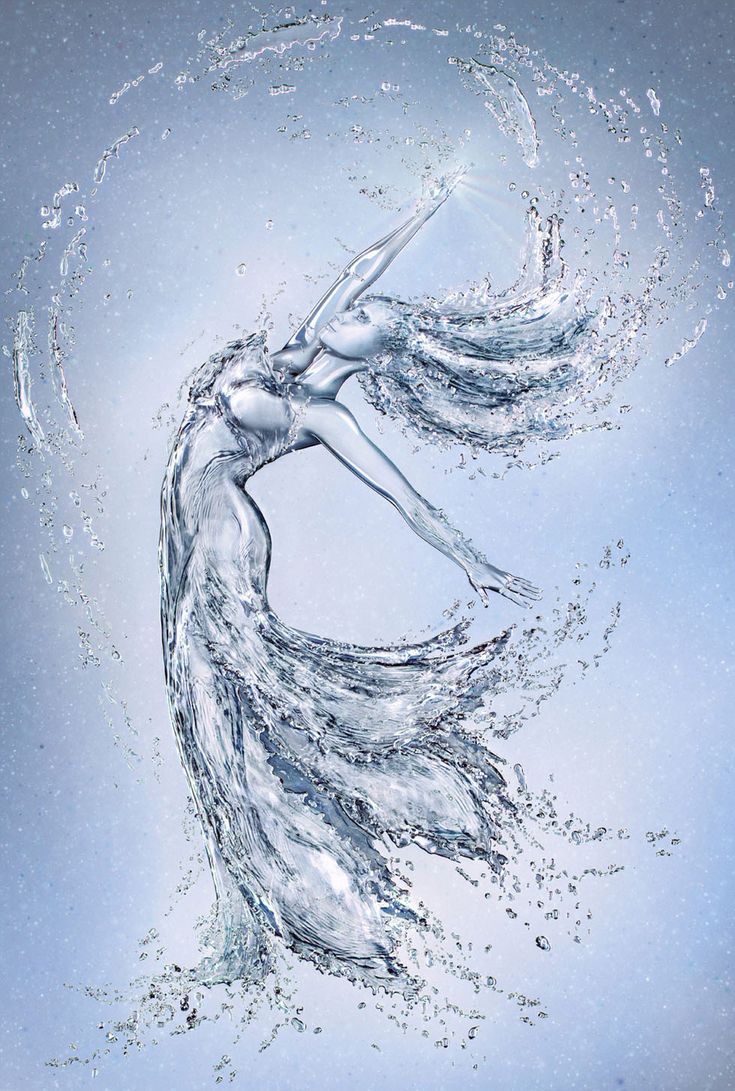 a woman is floating in the water with her arms outstretched