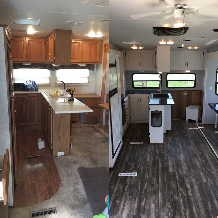 the inside of an rv with wood flooring and white appliances in it's kitchen area