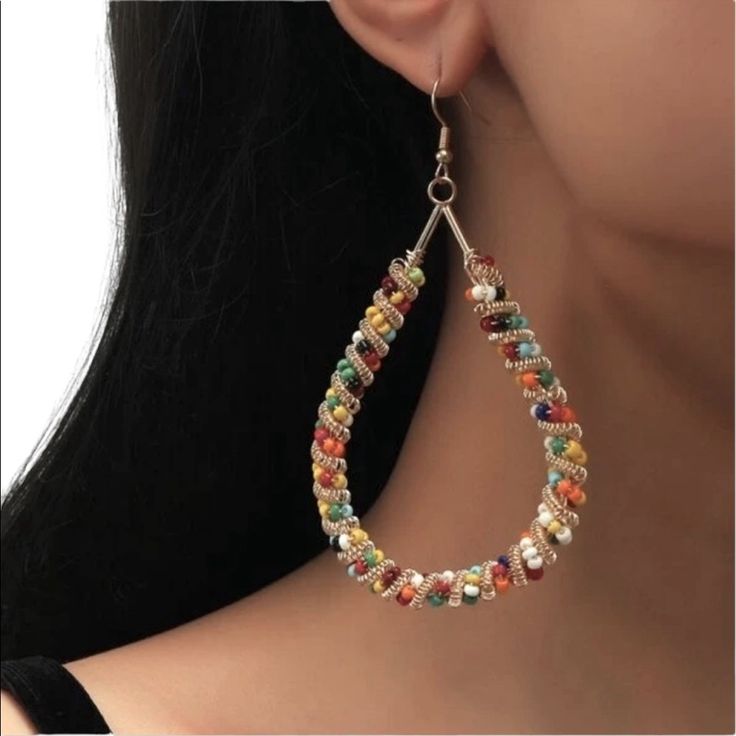 Boho Beaded Teardrop Earrings. Various Colored Glass Beads With Gold Tone Twisted Wire Accents. A Very Neat Pair Of Earrings To Go With Lots Of Outfits! Nwot! Bohemian Beaded Teardrop Earrings For Party, Multicolor Metal Earrings For The Beach, Multicolor Metal Earrings For Beach, Multicolor Dangle Teardrop Earrings For Summer, Multicolor Beaded Chain Earrings For Parties, Multicolor Bohemian Teardrop Earrings For Summer, Bohemian Multicolor Teardrop Earrings For Summer, Elegant Multicolor Beaded Hoop Earrings, Colorful Beaded Dangle Teardrop Earrings