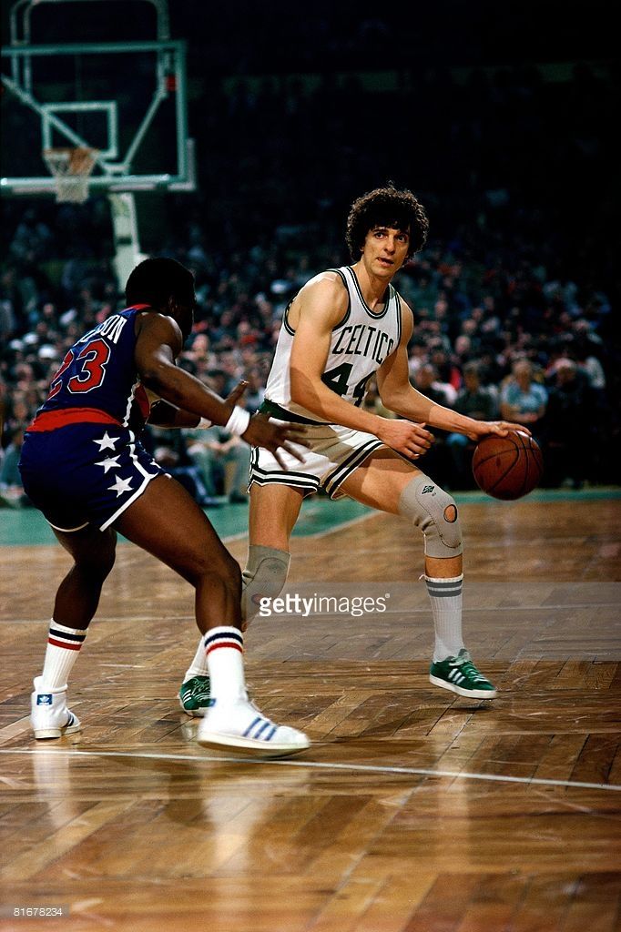 two basketball players in action on the court during a game stock - fotor