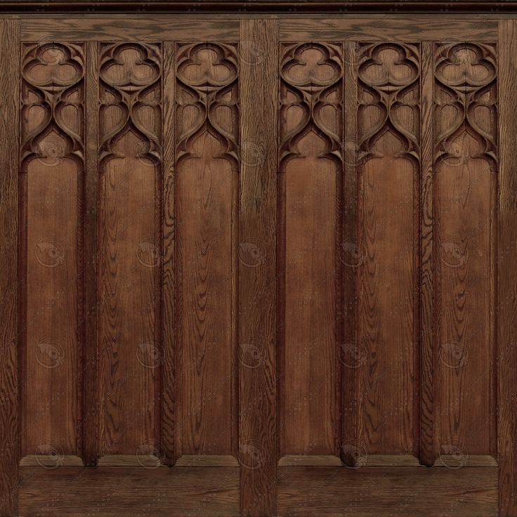 a wooden paneled door with carvings on the front and side panels, all carved in wood