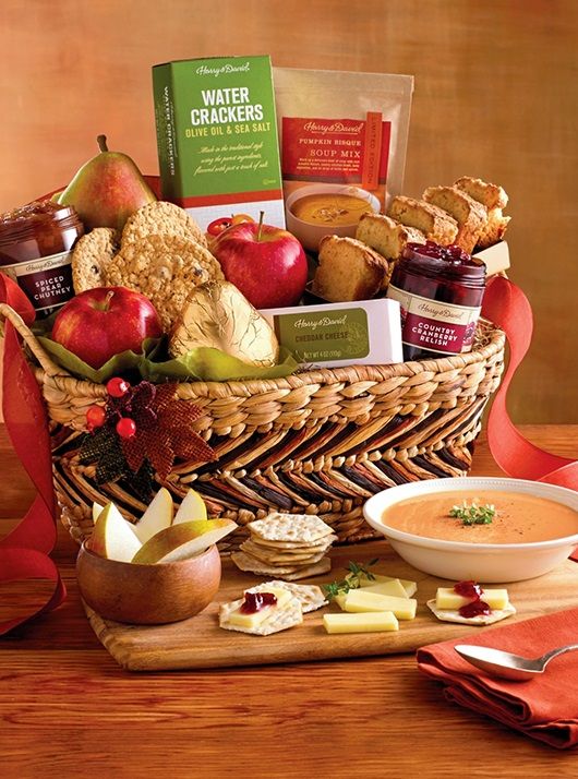 a basket filled with food sitting on top of a table next to utensils