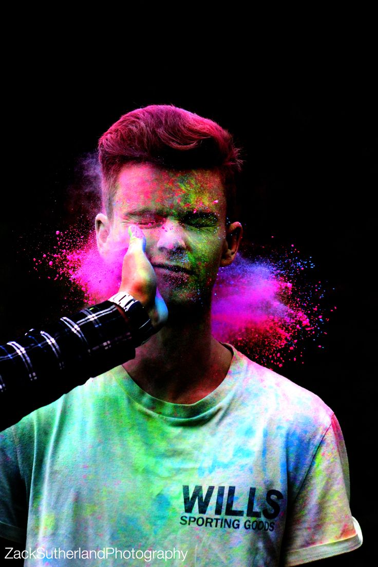 a man with colored powder on his face