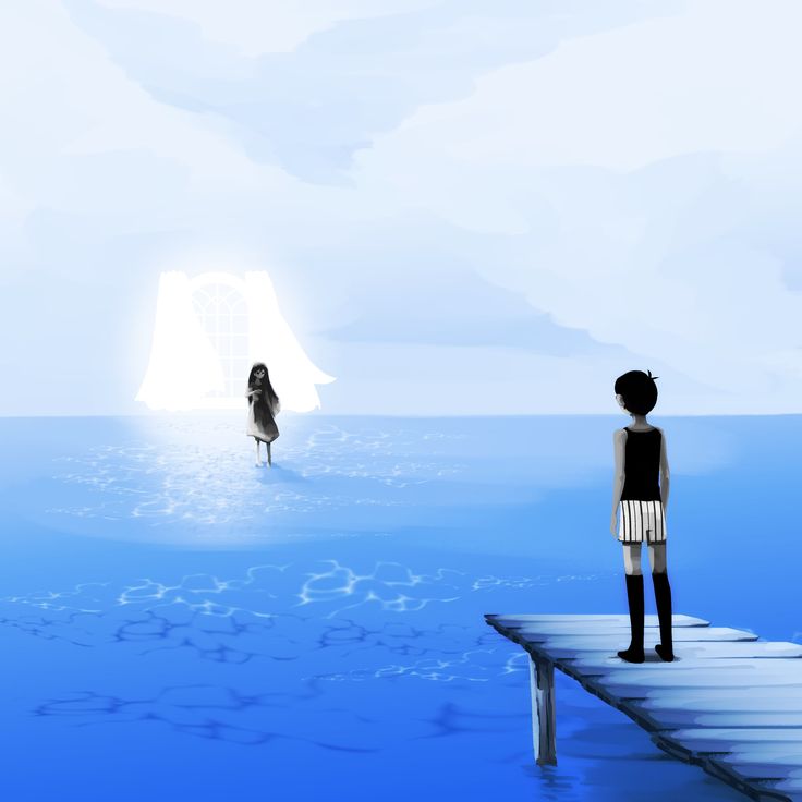 two people standing on a dock in the water