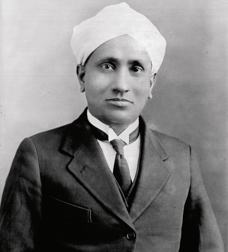 an old black and white photo of a man in a turban, suit and tie