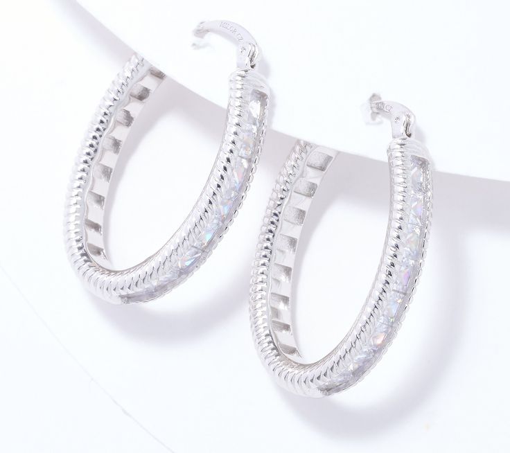 The ever-popular hoop now comes with a splash of sparkle! Not too big, not too small, these earrings get a brilliant update from style staple to style maker thanks to a radiant row of Diamonique simulated diamonds. Dazzling White Sparkling Hoop Earrings, Sparkling Diamond White Hoop Earrings, White Cubic Zirconia Sparkling Hoop Earrings, White Sparkling Cubic Zirconia Hoop Earrings, Sparkling White Cubic Zirconia Hoop Earrings, Sparkling White Hoop Earrings For Anniversary, Small Hoop Earrings In White Cubic Zirconia, Small Hoop White Cubic Zirconia Earrings, White Cubic Zirconia Small Hoop Earrings