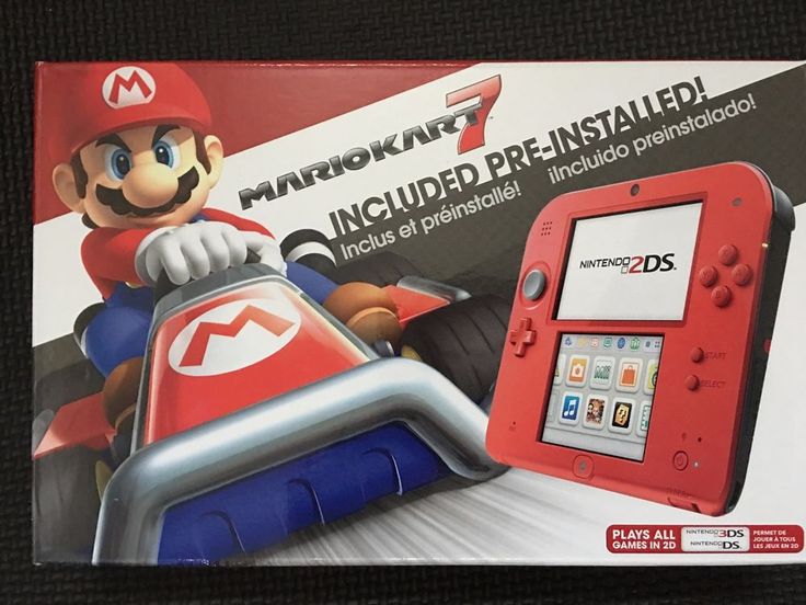 the nintendo wii mario kart is on display in front of a box for sale