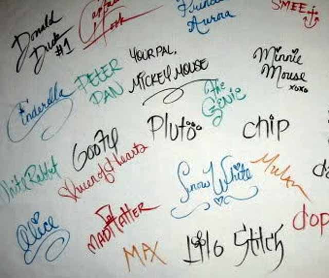 many different colored writing on a white wall