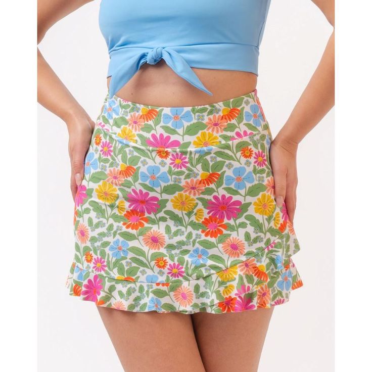 If you're looking for more coverage, but in a flirty & feminine way. this skirt features an ultra high waistline and our classic faux wrap front. You'll love pulling this skirt on and heading straight to the beach or pool. Fitted Skirt With Built-in Shorts For Day Out, Chic High Waist Flowy Tennis Skirt, High-waist Skirt With Wide Waistband For Summer, Spring Swim Skirt With Built-in Shorts, High Waist Skirt With Wide Waistband For Summer, Fitted High Waist Mini Skirt For Vacation, High Waist Fitted Mini Skirt For Vacation, Spring Lined Swim Skirt, Spring Flowy Lined Swim Skirt