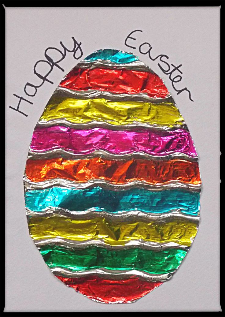 an easter egg made out of foil with the words happy easter written on it's side