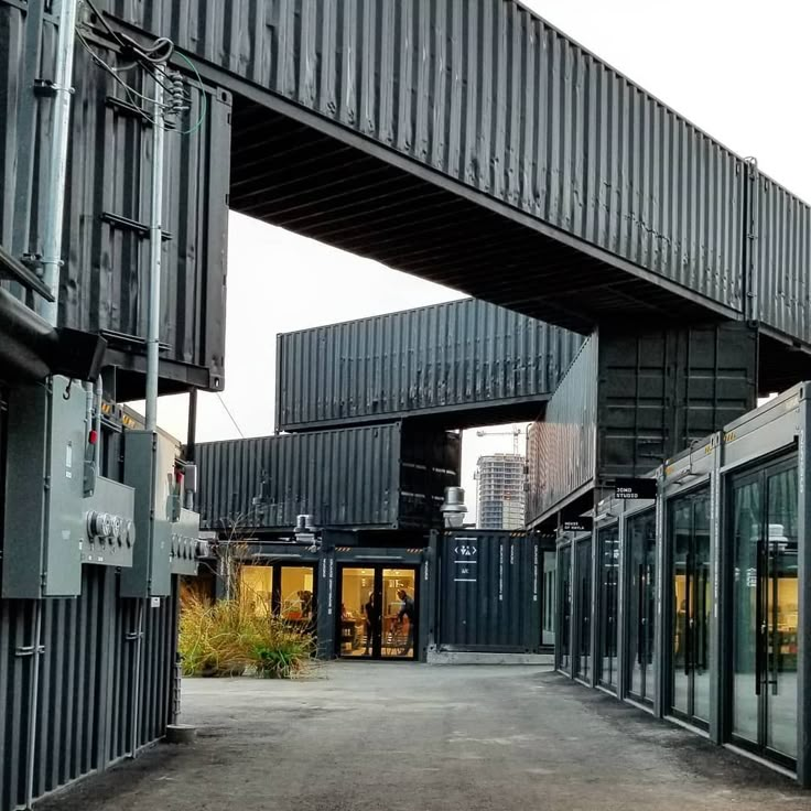 an empty parking lot with lots of shipping containers