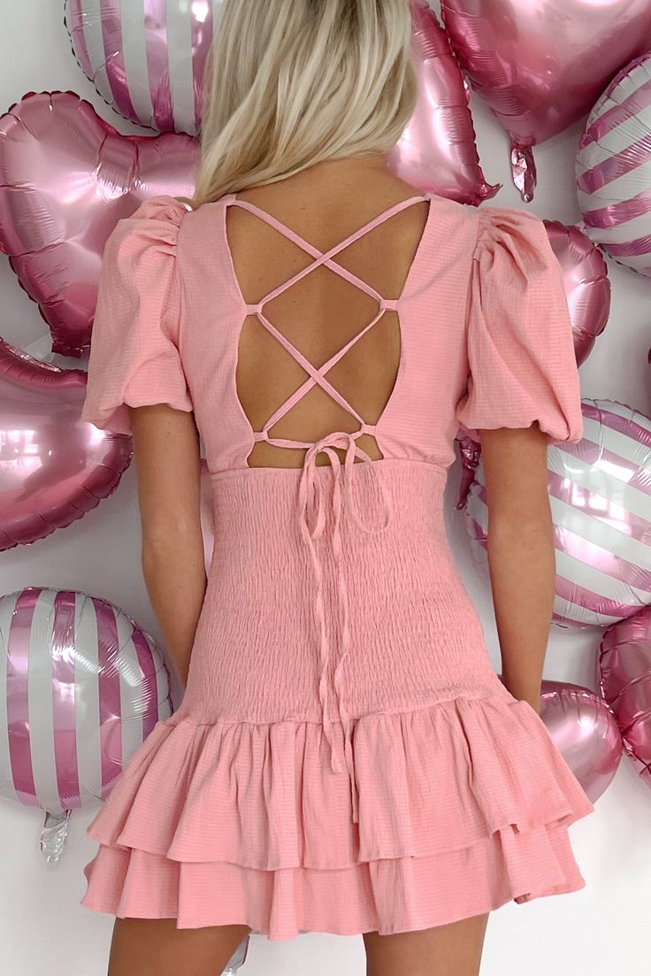 SELF: 56% POLYESTER, 43% COTTON, 1% SPANDEX. LINING: 100% POLYESTER Model Wearing Size Small Color: Baby Pink Textured Material Deep V-Neck Puffed Sleeves Back Lace-Up Detail Smocked Bodice Tiered/Ruffle Hem Mini Length Dress Has Stretch 2.5" Armpit To Sleeve End 23" Armpit To Hemline Video Product Color May Not Be Accurate For Model Size Specs Please Check Size Charts Launched: 12/29/23 Cute Fitted Mini Dress, Cute Puff Sleeve Dress For Summer Brunch, Cute Pink Puff Sleeve Party Dress, Sweet Fitted Dress With Puff Sleeves, Sweet Puff Sleeve Fitted Dresses, Cute Fitted Mini Dress With Ruffle Hem, Cute Pink Puff Sleeve Mini Dress, Cute Ruffled Puff Sleeve Dress, Sweet Fitted Dress For Brunch