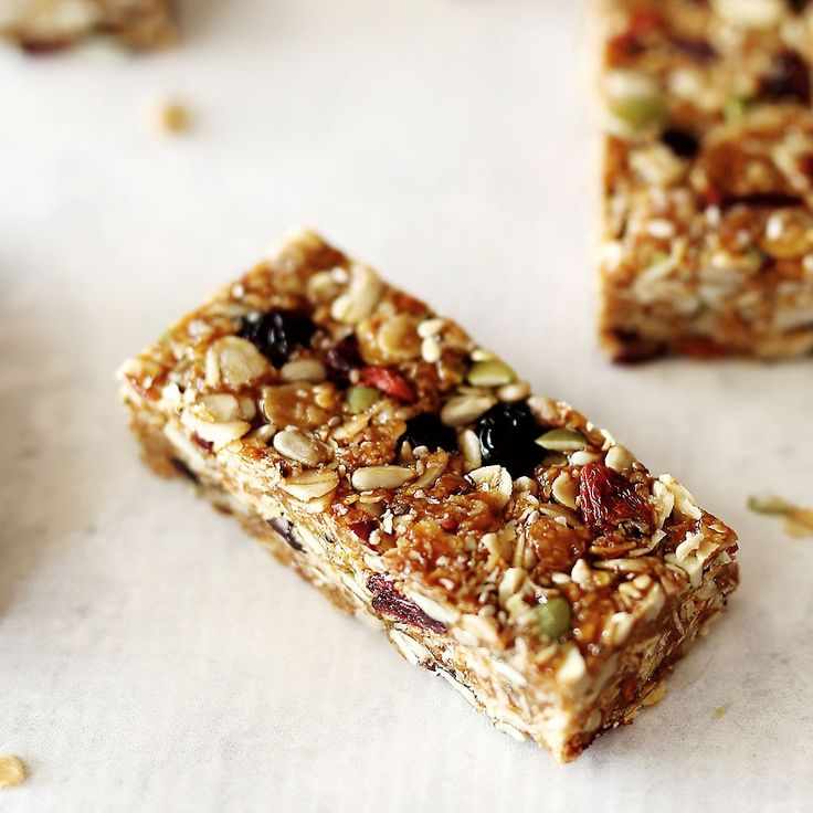 granola bars with nuts and raisins on top