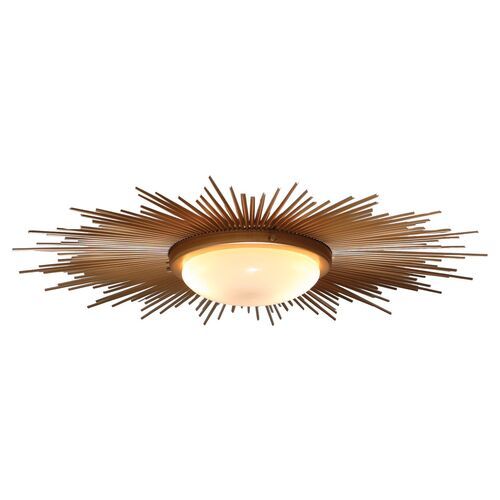 a ceiling light that is made out of wood and has sunbursts on it