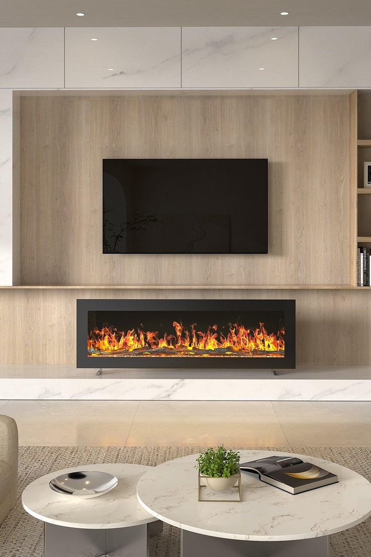 a modern living room with a fireplace in the center