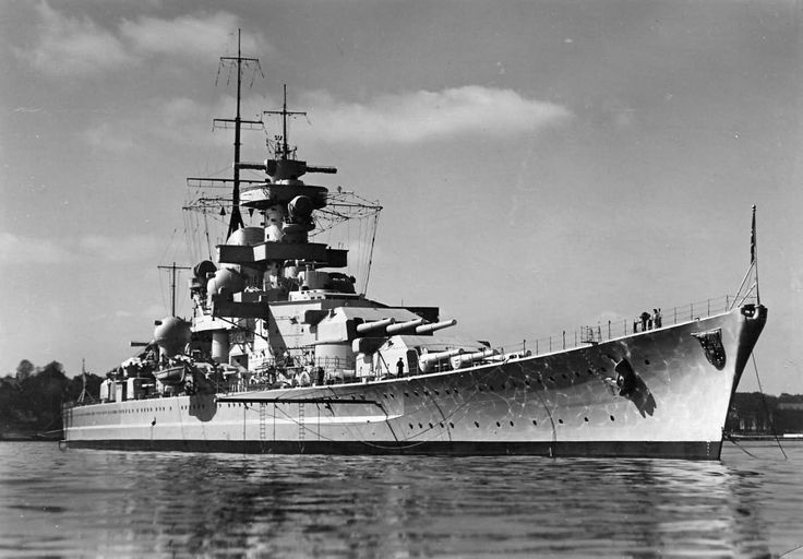 an old photo of a battleship in the water