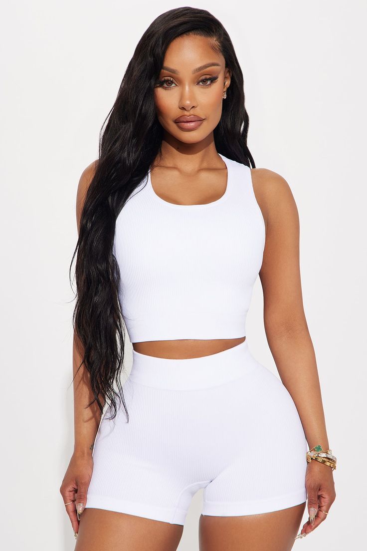 Available In Black, Tangerine, Hot Pink, And White. Sports Bra Crew Neck Padded Sleeveless Effortless Seamless Backless High Impact Stretch Pair With "Beach Body Effortless Seamless Active Yoga Pant" 92% Nylon 8% Elastane Imported | Beach Body Effortless Seamless Sports Bra in White size XS by Fashion Nova Sleeveless Crop Top With Built-in Bra, Sleeveless Seamless Athleisure Crop Top, Sleeveless High Stretch Seamless Activewear, White Sleeveless Crop Top For Sports, White Sleeveless Sports Crop Top, High Stretch Seamless White Tank Top, Compressive Sleeveless Sports Bra With Seamless Design, Compressive Seamless Tank Top For Workout, Compressive Seamless Sleeveless Sports Bra