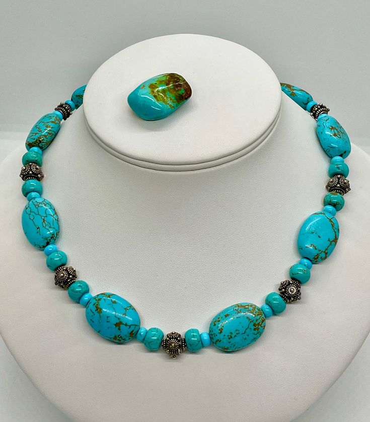 Turquoise mined from the earth and the color of the sky. The gemstone is coupled with Bali Silver. Turquoise Gemstones For Healing, Elegant Turquoise Chrysoprase Necklace, Blue Turquoise Necklace With Stones, Turquoise Jewelry With Natural Stones For Healing, Unique Blue Turquoise Necklace With Stones, Elegant Turquoise Cabochon Gemstones, Spiritual Blue Jewelry With Gemstone Accents, Spiritual Turquoise Gemstone Necklace, Spiritual Turquoise Jewelry With Gemstone Accents