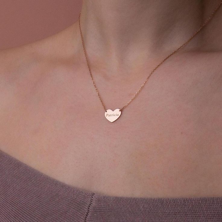 Stylish and minimalist 14K gold personalized heart necklace for everyday wear. Great for layering.  Unique personalized gift idea to show love to the important people in your life with a cute, dainty, and creative gift. The custom name necklace makes a perfect birthday gift for mothers, friends or yourself.  A special anniversary gift for significant others. Just engrave his/her name. It is a perfect gift. It can be dressed up or dressed down depending on the situation. We only use the highest q Minimalist Personalized Charm Necklaces For Valentine's Day, Customized Dainty Heart Necklace, Minimalist Personalized Heart Pendant Charm Necklaces, Customizable Heart Charm Necklace For Birthday, Minimalist Personalized Name Necklace For Valentine's Day, Minimalist Personalized Heart Pendant Charm Necklace, Minimalist Customizable Name Necklace For Valentine's Day, Customizable Heart Charm Necklaces, Dainty Customized Heart-shaped Necklace