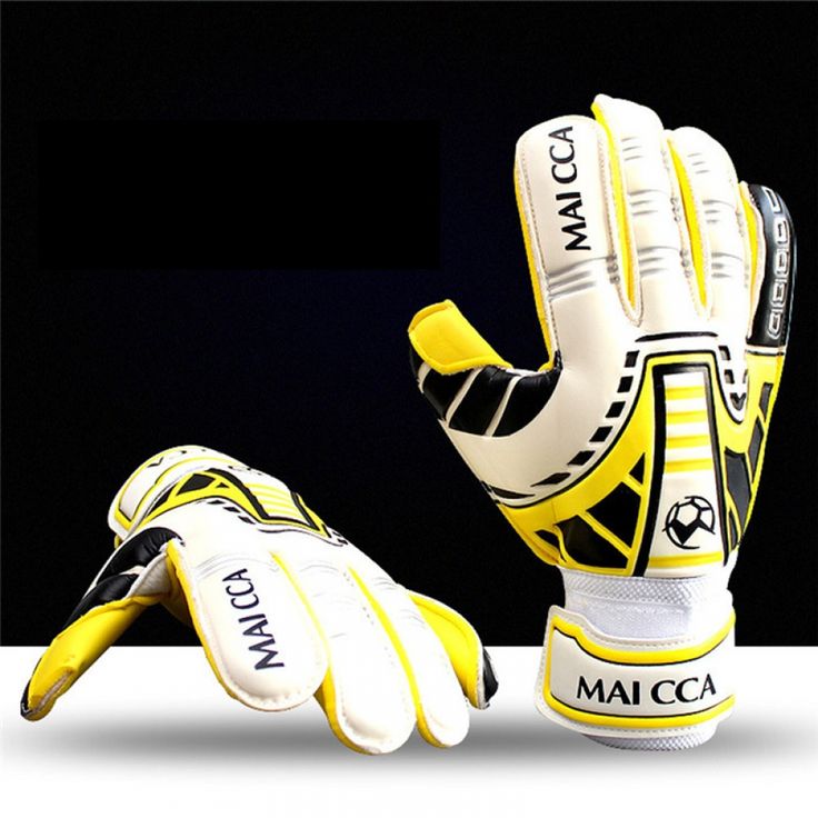 an image of a yellow and white goalie glove with the word macca on it