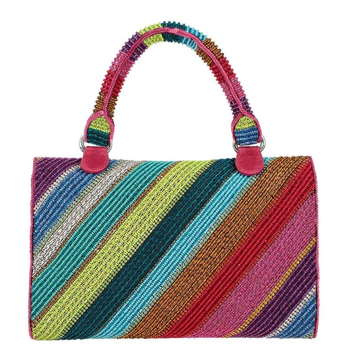 Get ready to make a statement with our Out of Line top handle bag! Bursting with rainbow-hued embroidery and rhinestone chain stripes , this handbag is guaranteed to add a pop of color to any outfit. 9 x 2 x 6" Handle Length End to End: 10" | Handle Drop: 5" Removable Chain Strap Length: 49" | Strap drop: 24.5" Non-removable top handle, removable crossbody chain strap, turn-lock closure, inside pocket, fits a cell phone This is a handmade item, each one an individual work of art. Slight variatio Multicolor Rectangular Evening Bag, Multicolor Double Handle Evening Bag, Multicolor Top Handle Evening Bag, Multicolor Handheld Evening Bag With Detachable Handle, Rainbow Rectangular Bag For Parties, Rainbow Rectangular Party Bag, Rhinestone Chain, A Cell, Handle Bag