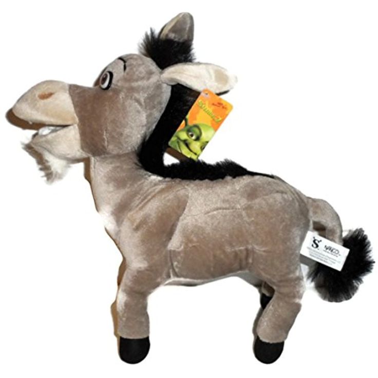 a stuffed donkey with a book in its mouth