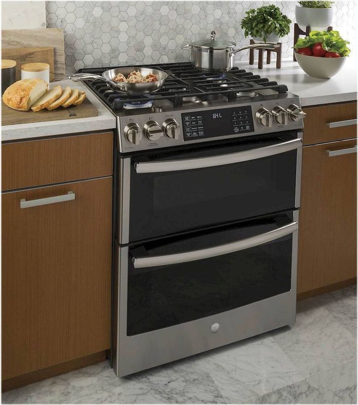 an oven with two burners in a kitchen