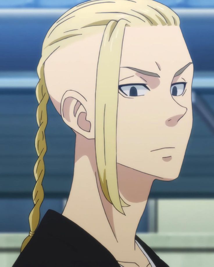 a woman with blonde hair and braids looks off to the side while staring at something