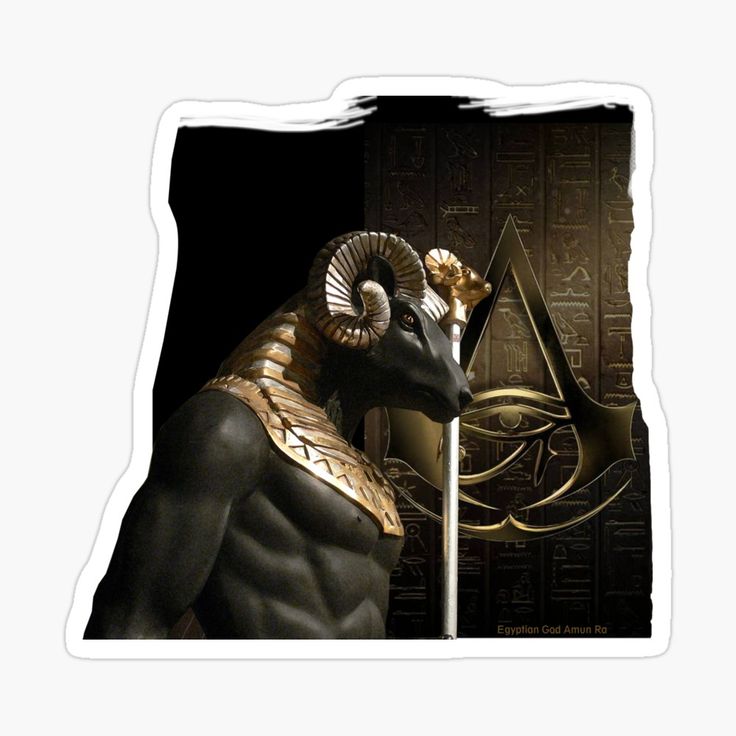 an egyptian ram sticker on a black and gold background with the letter a in it's center