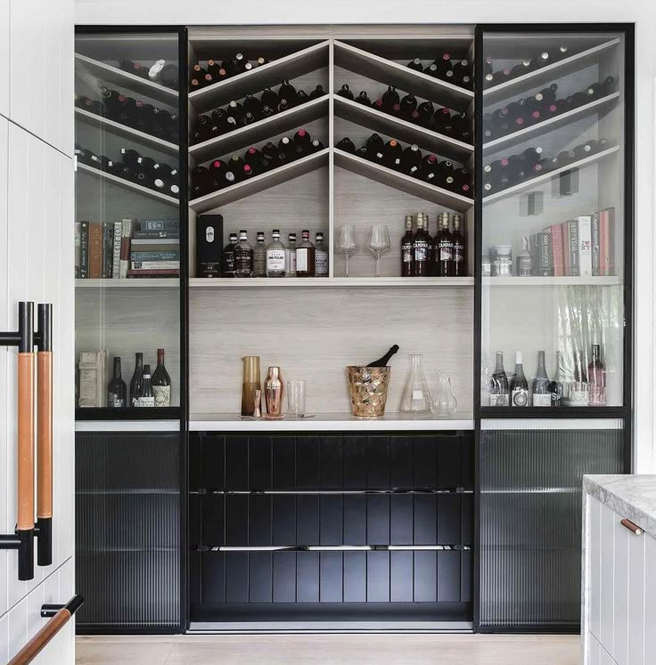 the kitchen is clean and ready to be used as a wine bar or tasting room