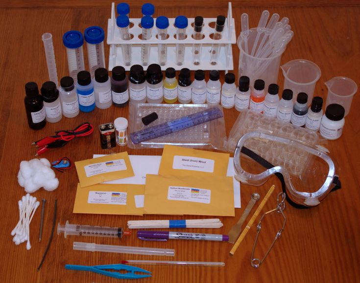 an assortment of laboratory supplies on a table