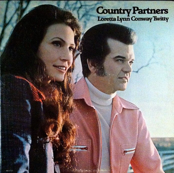 the country partners album cover with an image of a man and woman