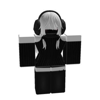 a black and white doll with headphones on it's ears, standing in front of a white background