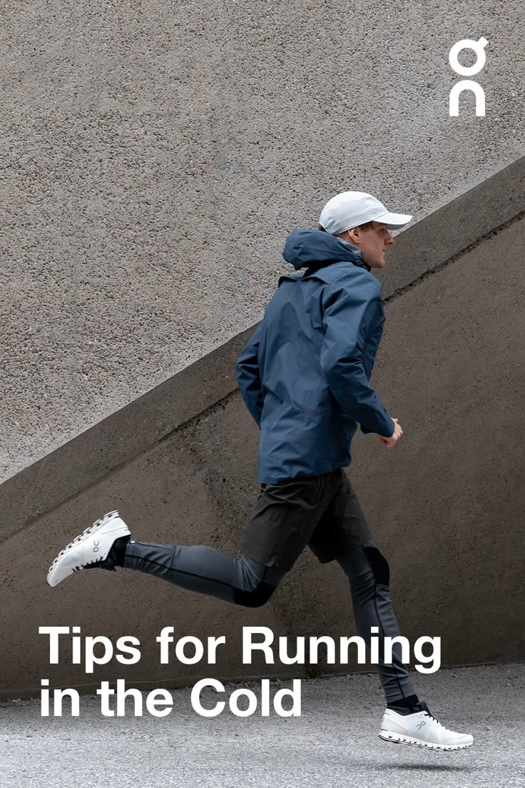 a man running up the side of a building with text overlaying it that reads tips for running in the cold