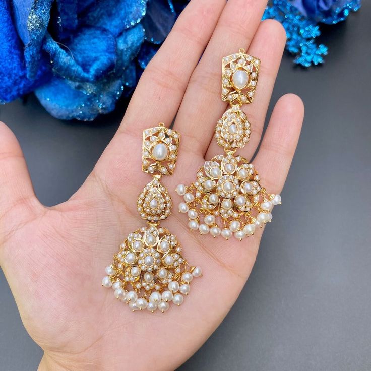 Featuring pearl earrings made in 22ct gold and set with freshwater pearls. The earrings weigh 23.43 GMs including 3.22 GMs in hanging beads 22k Gold Jewelry Necklaces, 22k Gold Jewelry, Hanging Beads, Pearl Necklace Set, Gold Jewelry Necklace, Emerald Necklace, Gold Bangle Bracelet, 22k Gold, Pendant Set