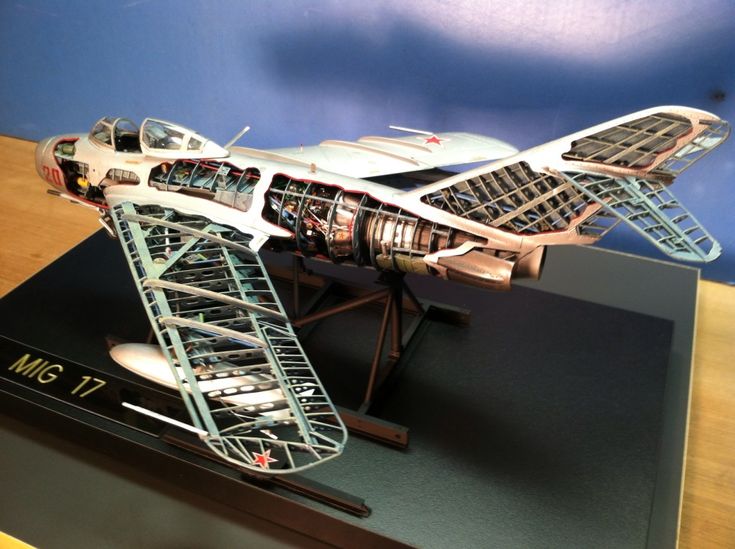 a model airplane is on display in a museum