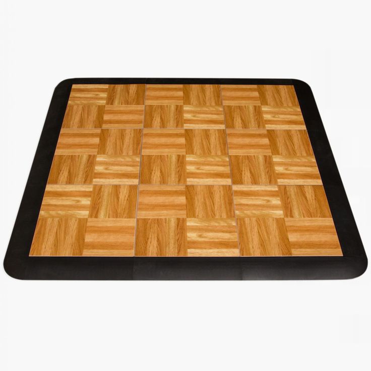 an image of a wooden table top with square tiles on the bottom and black edges