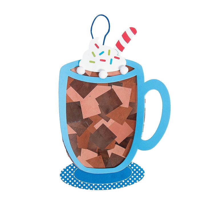 a paper cut out of a coffee cup with sprinkles and a candy cane