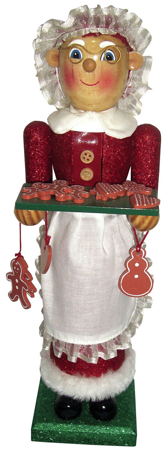 a santa clause holding a tray with cookies on it