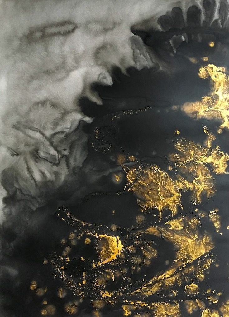 an aerial view of the ocean and land from space, with gold foiling on it