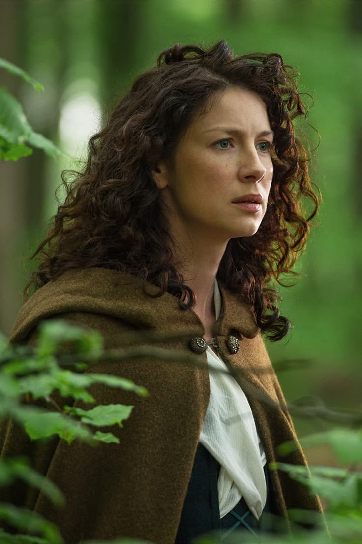 a woman standing in the woods with a quote on her face that says, bonny the scottish word for good or beautiful