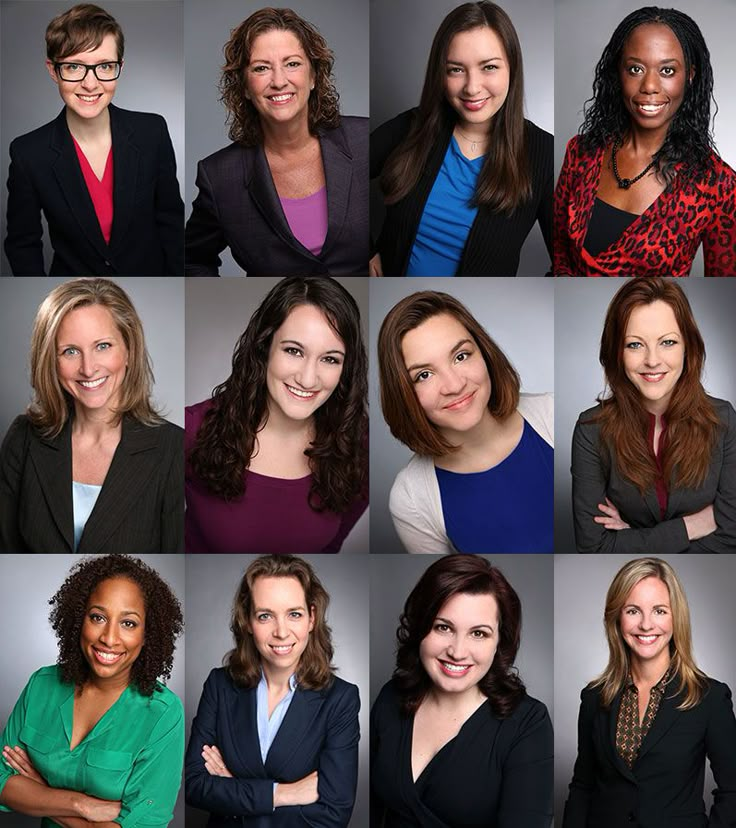 many women are smiling and posing for the camera, all wearing business attire with their arms crossed